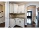 Elegant kitchen with corner cabinetry, granite counters, and stainless steel refrigerator at 15225 Kissimmee Ln, Mint Hill, NC 28227