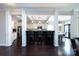 Gourmet kitchen with granite counters, stainless appliances, and seating at the kitchen island at 15225 Kissimmee Ln, Mint Hill, NC 28227