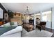 Inviting living room with open layout, hardwood floors, and stylish furnishings at 15225 Kissimmee Ln, Mint Hill, NC 28227