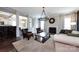 Spacious living room with fireplace, hardwood floors, and open floor plan at 15225 Kissimmee Ln, Mint Hill, NC 28227