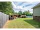 Backyard featuring a pool, covered deck, and grill for outdoor gatherings at 1812 Sam Smith Rd, Fort Mill, SC 29708