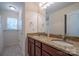 Bathroom featuring a double sink vanity with granite counters and large mirror at 1812 Sam Smith Rd, Fort Mill, SC 29708