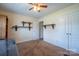 Bedroom with neutral walls, carpet, ceiling fan and closet at 1812 Sam Smith Rd, Fort Mill, SC 29708
