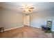 Bedroom with neutral walls, carpet, ceiling fan and ensuite access at 1812 Sam Smith Rd, Fort Mill, SC 29708