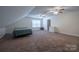 Cozy carpeted bedroom with ceiling fans and natural light from the window at 1812 Sam Smith Rd, Fort Mill, SC 29708