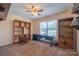 Neutral bedroom with shelves and a desk under the light-filled window at 1812 Sam Smith Rd, Fort Mill, SC 29708
