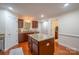 Kitchen features an island and views of the sink and entry to other rooms at 1812 Sam Smith Rd, Fort Mill, SC 29708