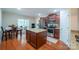 Kitchen features an island, stainless steel appliances, and a dining area at 1812 Sam Smith Rd, Fort Mill, SC 29708