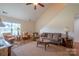 Spacious living room featuring high ceilings, natural light, and comfortable seating at 1812 Sam Smith Rd, Fort Mill, SC 29708