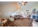Bright living room featuring a vaulted ceiling, fireplace, and hardwood floors at 1812 Sam Smith Rd, Fort Mill, SC 29708