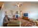 Inviting living room with fireplace, hardwood floors, and vaulted ceilings at 1812 Sam Smith Rd, Fort Mill, SC 29708