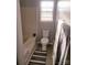 Bathroom featuring bathtub, toilet, wood floors and striped rug at 19057 Coachmans Trce, Cornelius, NC 28031