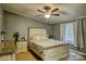 Bedroom with a ceiling fan and neutral decor and two windows offering natural light at 2006 Kollege Ln, Crouse, NC 28033