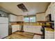 Classic kitchen features white cabinets, laminate countertops and modern appliances at 2006 Kollege Ln, Crouse, NC 28033