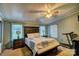 Comfortable bedroom features neutral colors, with a padded bench and two windows offering natural light at 2006 Kollege Ln, Crouse, NC 28033