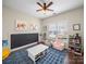 Charming ' room with chalkboard, colorful decor, ceiling fan, and bright natural light at 20132 Tailwind Ln, Cornelius, NC 28031