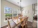 Charming dining room with hardwood floors, natural light and garden view at 20132 Tailwind Ln, Cornelius, NC 28031