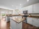 Modern kitchen featuring granite countertops and stainless steel appliances at 20132 Tailwind Ln, Cornelius, NC 28031