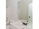 This bathroom features a tub/shower combination, toilet, and a vanity with a large mirror at 2104 Congress Ct, Kannapolis, NC 28083