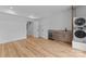 Finished basement with bar area, wine fridge, and washer/dryer hookups at 215 Keswick Ave, Charlotte, NC 28206
