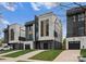 Modern townhomes showcase contemporary architecture and private driveways at 215 Keswick Ave, Charlotte, NC 28206