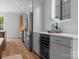 Sleek kitchen with stainless steel appliances, wine cooler, and a view of the kitchen island at 215 Keswick Ave, Charlotte, NC 28206