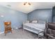 Comfortable bedroom with carpet, ceiling fan, and space for a full bed and furnishings at 2409 Deberry Ct, Charlotte, NC 28213