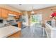 Eat-in kitchen featuring stainless steel appliances and a glass table at 2409 Deberry Ct, Charlotte, NC 28213