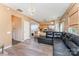 Open-concept living room with modern flooring flowing into an eat-in kitchen at 2409 Deberry Ct, Charlotte, NC 28213