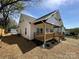Inviting exterior with a charming porch and well-manicured lawn at 312 W Henderson St, Salisbury, NC 28144