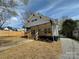 Exterior showcasing a welcoming porch and landscaped surroundings at 312 W Henderson St, Salisbury, NC 28144