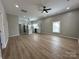 Bright living room features an open layout, seamlessly connected to the modern kitchen at 312 W Henderson St, Salisbury, NC 28144