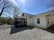 Rear exterior featuring a covered porch and private entrance at 312 W Henderson St, Salisbury, NC 28144