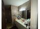 Bathroom with a vanity, mirror, and good lighting, offering functionality and style at 3452 Odell School Rd, Concord, NC 28027