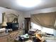 Bedroom requiring tidying with a window, dresser, and a television at 3452 Odell School Rd, Concord, NC 28027
