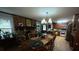 Bright dining room featuring a wooden table and chairs and access to the kitchen at 3452 Odell School Rd, Concord, NC 28027