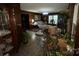 Spacious living room filled with plants and featuring a vintage curio cabinet at 3452 Odell School Rd, Concord, NC 28027
