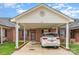 Inviting brick home featuring a covered carport and well-maintained lawn, perfect for comfortable living at 3921 Sage Ct, Denver, NC 28037