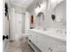 Bright bathroom featuring double sink vanity, modern fixtures, and tile flooring at 4012 Flagstone Dr, Lancaster, SC 29720