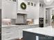 Well appointed gourmet kitchen with stainless steel appliances, granite countertops and custom cabinetry at 4012 Flagstone Dr, Lancaster, SC 29720