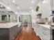 Gourmet kitchen with a large island and breakfast nook that opens to a large open living room at 4012 Flagstone Dr, Lancaster, SC 29720
