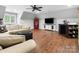 Spacious living room with hardwood floors, neutral furniture, and a cozy atmosphere at 4012 Flagstone Dr, Lancaster, SC 29720