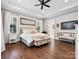Spacious main bedroom with hardwood flooring, trey ceiling, bench, and natural light at 4012 Flagstone Dr, Lancaster, SC 29720