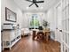Well-lit home office featuring hardwood floors, natural light, and neutral paint at 4012 Flagstone Dr, Lancaster, SC 29720