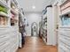 Spacious walk-in closet with custom shelving and drawer storage at 4012 Flagstone Dr, Lancaster, SC 29720
