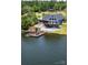 Beautiful lakefront property featuring a private dock and lake views at 428 Pinehaven Dr, New London, NC 28127
