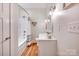 Bright bathroom with a shower-tub combo, vanity, and stylish fixtures, offering a clean and functional space at 428 Pinehaven Dr, New London, NC 28127