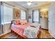 Inviting bedroom with a comfortable bed, decorative artwork, and ample natural light, creating a tranquil space at 428 Pinehaven Dr, New London, NC 28127