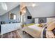 Bedroom features a vaulted ceiling, modern decor, and lots of natural light at 428 Pinehaven Dr, New London, NC 28127