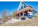 Stunning lakefront home with spacious deck and beautiful outdoor entertaining space at 428 Pinehaven Dr, New London, NC 28127